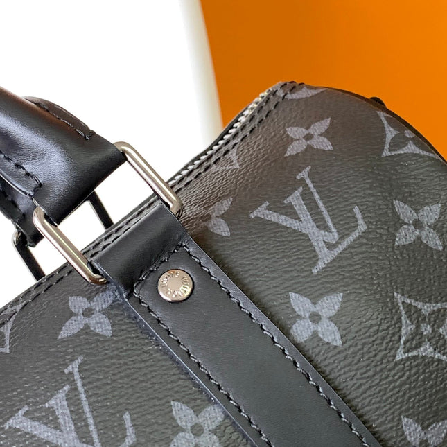 KEEPALL BANDOULIÈRE 25 IN BLACK MONOGRAM HERITAGE CANVAS