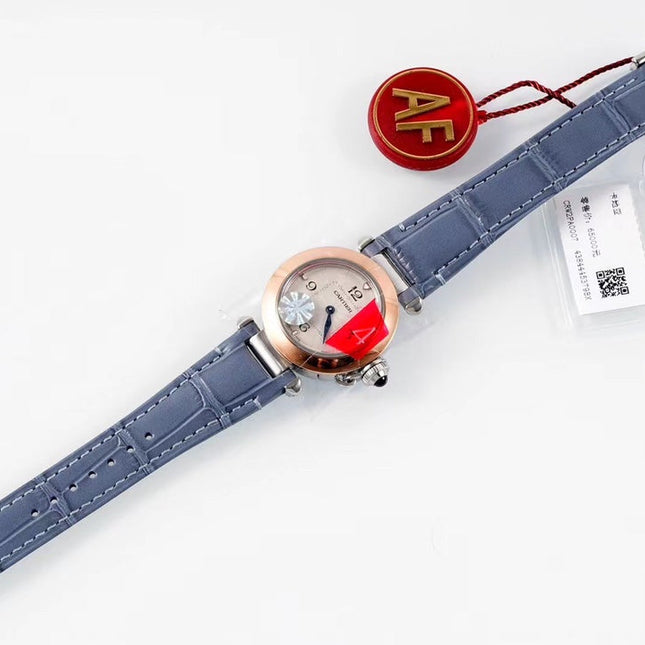 PASHA DE CARTIER WATCH ROSE GOLD AND SILVER CASE AND STONE BLUE LEATHER STRAP
