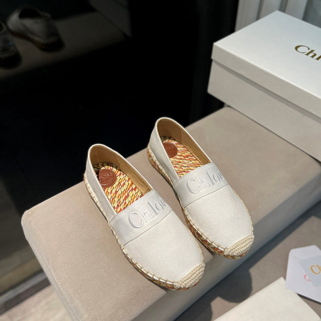 LOAFERS IN WHITE FABRIC AND RAFFIA