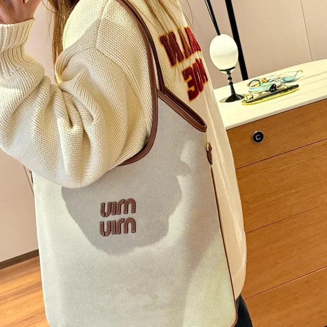 IVY 40 TOTE IN WHITE CANVAS