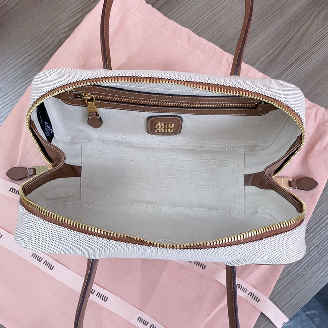 BOWLING BAG 28 IN WHITE CANVAS AND BROWN CALFSKIN TRIM