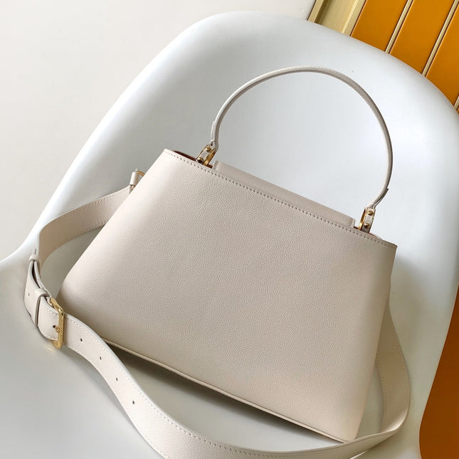 CAPUCINES 33 IN OFF WHITE CALFSKIN GOLD HARDWARE