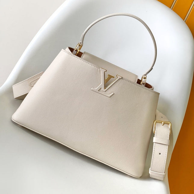 CAPUCINES 33 IN OFF WHITE CALFSKIN GOLD HARDWARE