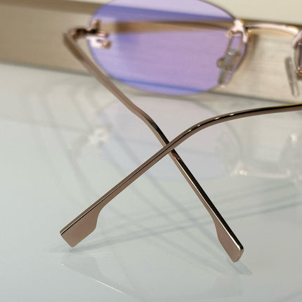 FIRST CRYSTAL RIMLESS OVAL FRAME SUNGLASSES FE4075US IN METAL