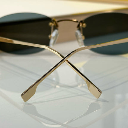 FIRST CRYSTAL RIMLESS OVAL FRAME SUNGLASSES FE4075US IN METAL