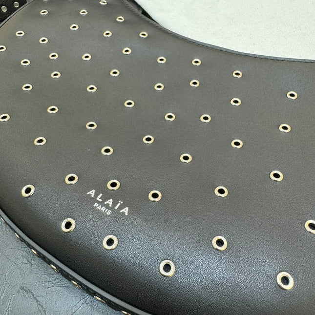 ONE PIECE DEMI LUNE BAG 31 IN BLACK SHEEPSKIN EYELET DETAILING