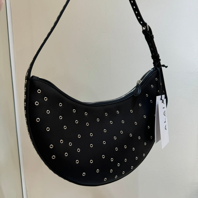 ONE PIECE DEMI LUNE BAG 31 IN BLACK SHEEPSKIN EYELET DETAILING