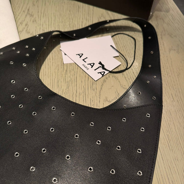ONE PIECE MEDIUM BAG 39 IN BLACK SHEEPSKIN EYELET DETAILING