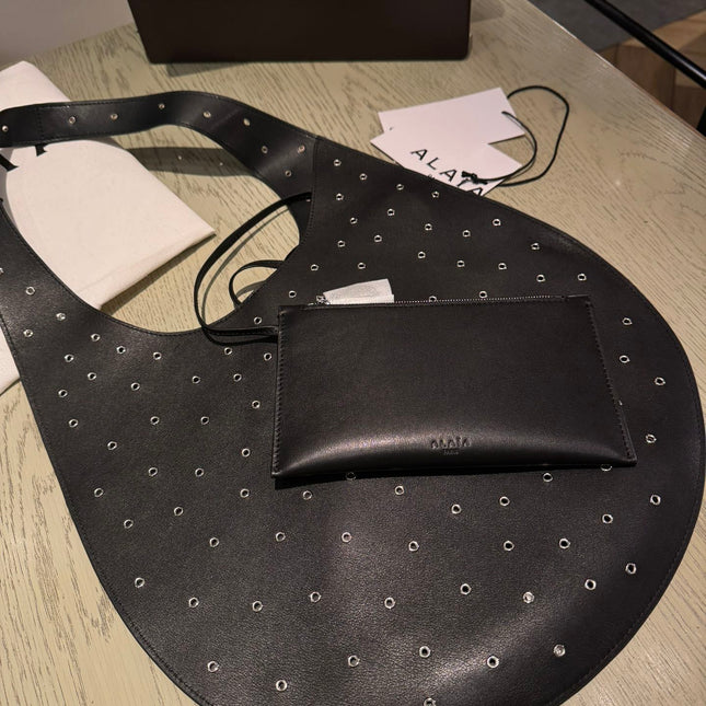 ONE PIECE MEDIUM BAG 39 IN BLACK SHEEPSKIN EYELET DETAILING