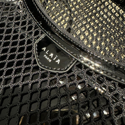 ONE PIECE MEDIUM BAG 43 IN BLACK FISHNET