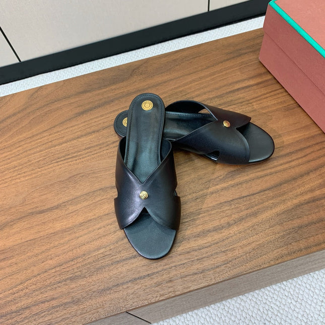 FLAT SLIPPERS IN BURNT ORANGE CALFSKIN