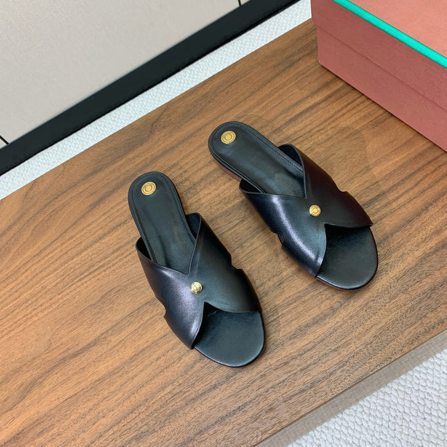 FLAT SLIPPERS IN BURNT ORANGE CALFSKIN