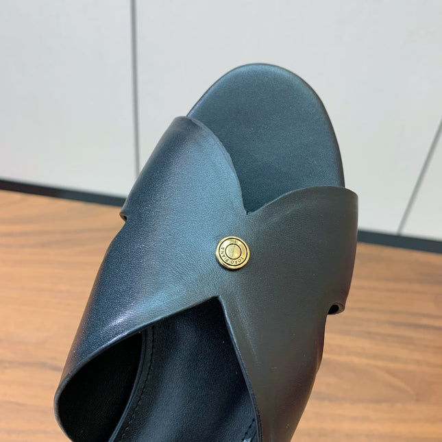 FLAT SLIPPERS IN BURNT ORANGE CALFSKIN