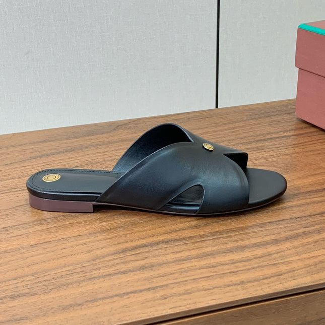FLAT SLIPPERS IN BURNT ORANGE CALFSKIN