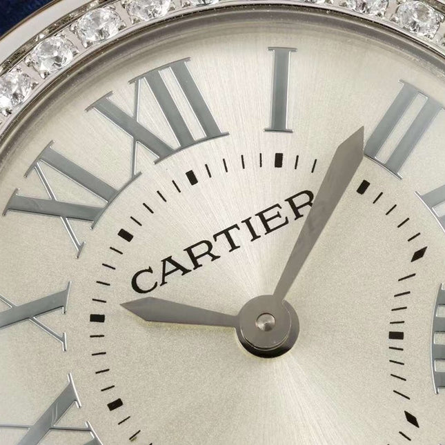 BALLON BLANC DE CARTIER WATCH GOLD CASE AND NAVY BLUE CALFSKIN WITH CRYSTALS