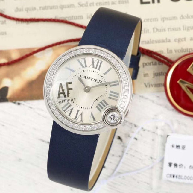 BALLON BLANC DE CARTIER WATCH GOLD CASE AND NAVY BLUE CALFSKIN WITH CRYSTALS