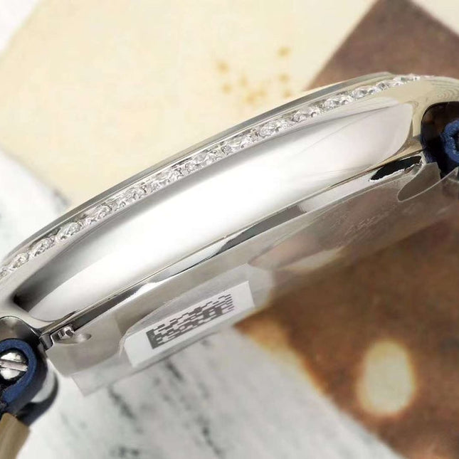 BALLON BLANC DE CARTIER WATCH GOLD CASE AND NAVY BLUE CALFSKIN WITH CRYSTALS
