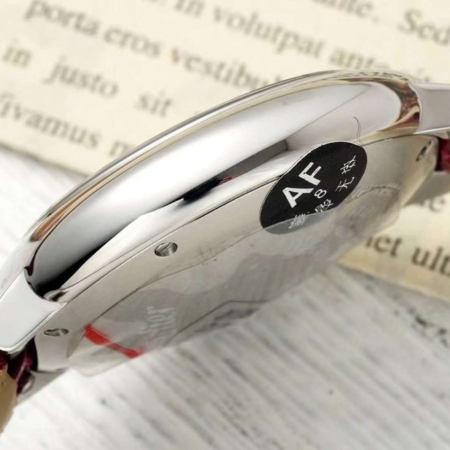 BALLON BLEU DE CARTIER 33 MM WATCH SILVER CASE WITH RUBY RED LEATHER STRAP