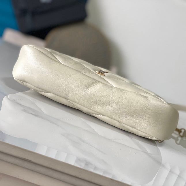 26 WHITE SHEEPSKIN WITH GOLD BUCKLE BAG