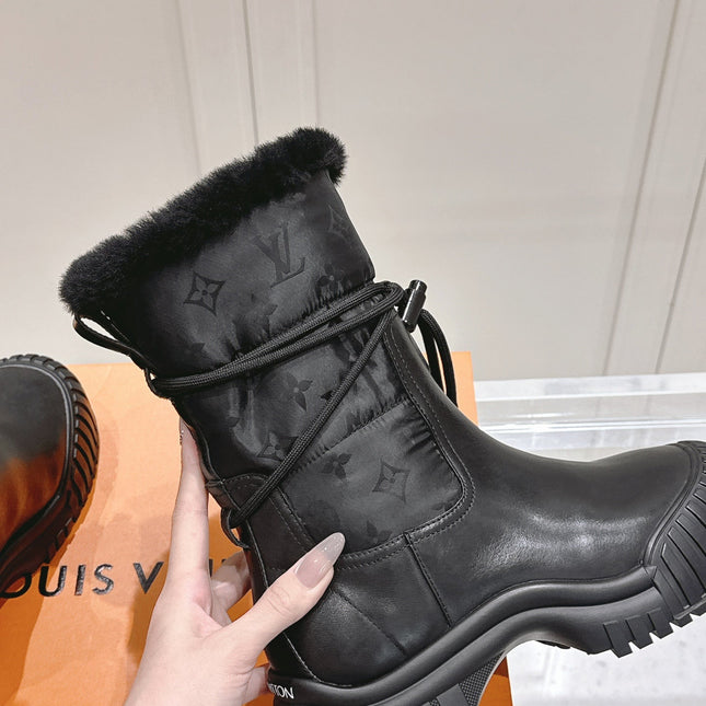 RUBY FLAT ANKLE BOOT IN BLACK CALFSKIN AND MONOGRAM NYLON