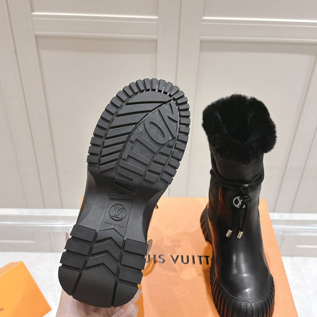 RUBY FLAT ANKLE BOOT IN BLACK CALFSKIN AND MONOGRAM NYLON