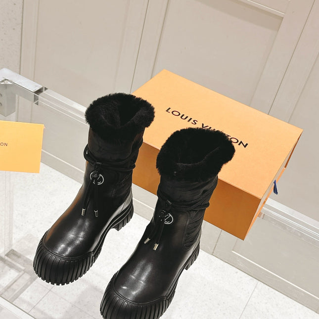 RUBY FLAT ANKLE BOOT IN BLACK CALFSKIN AND MONOGRAM NYLON