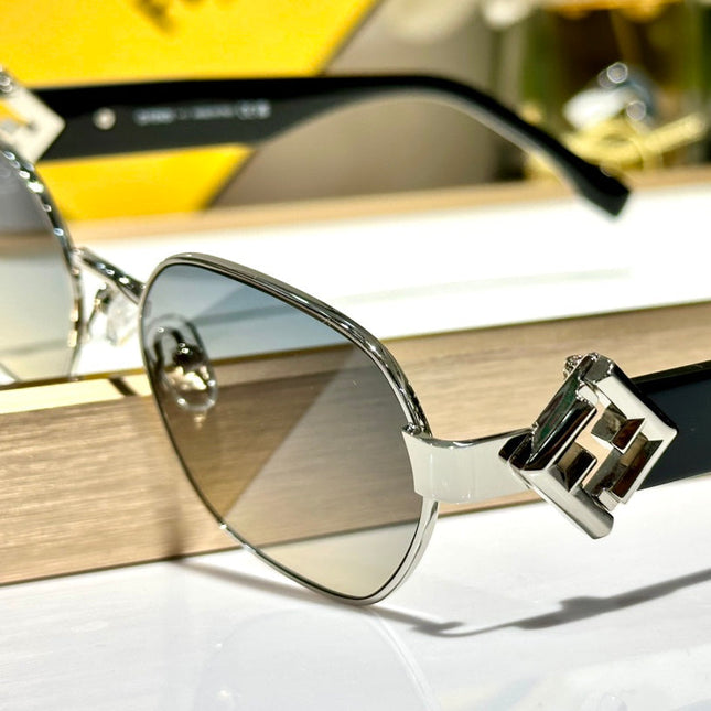 TRAVEL ROUND FRAME SUNGLASSES FE40148l  IN METAL AND ACETATE