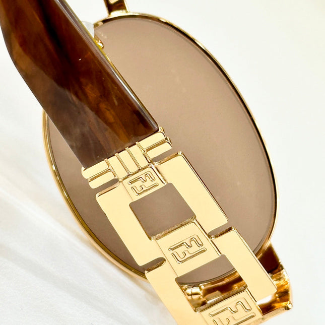 FIRST CRYSTAL OVAL FRAME SUNGLASSES 7076 IN METAL