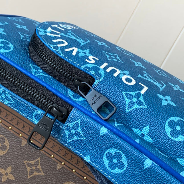 AVENUE SLINGBAG 31 IN BLUE AND BROWN TAIGA LEATHER