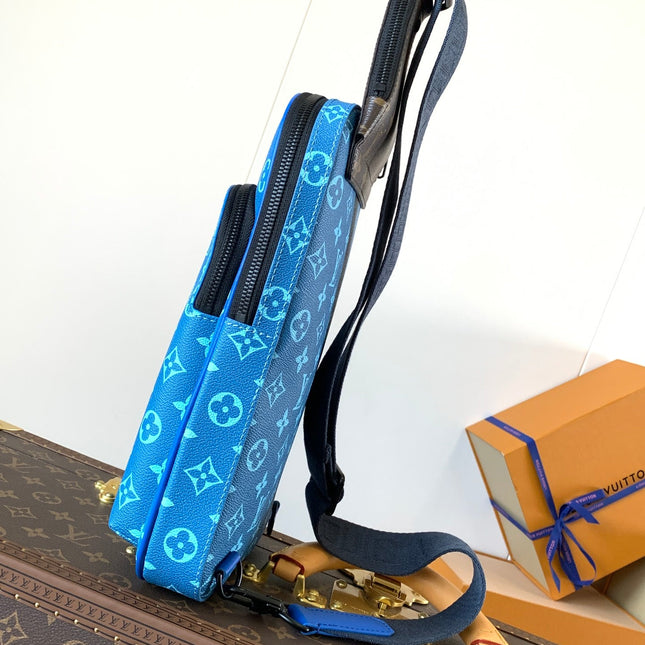 AVENUE SLINGBAG 31 IN BLUE AND BROWN TAIGA LEATHER