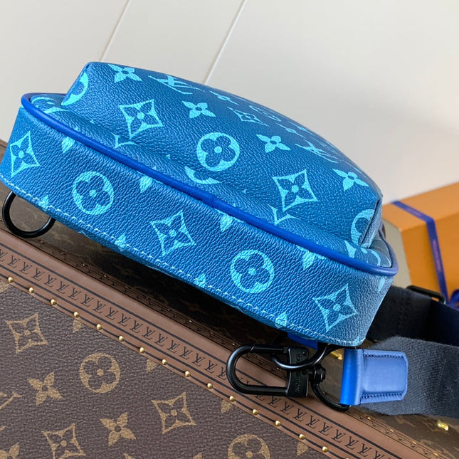 AVENUE SLINGBAG 31 IN BLUE AND BROWN TAIGA LEATHER