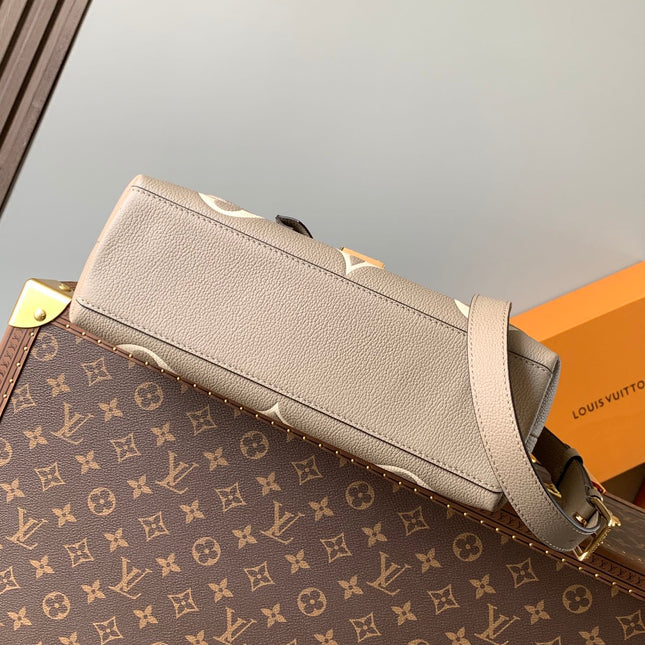MADELEINE 30 IN BEIGE MONOGRAM CALFSKIN EMBOSSED LOGO