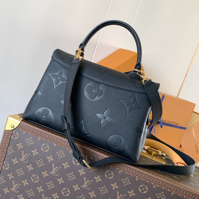 MADELEINE 30 IN BLACK MONOGRAM CALFSKIN EMBOSSED LOGO