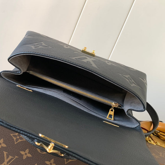 MADELEINE 30 IN BLACK MONOGRAM CALFSKIN EMBOSSED LOGO