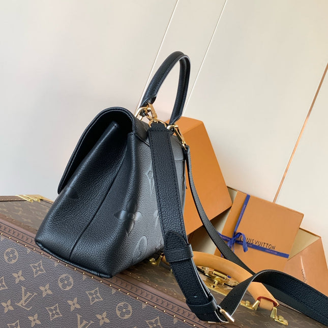 MADELEINE 30 IN BLACK MONOGRAM CALFSKIN EMBOSSED LOGO