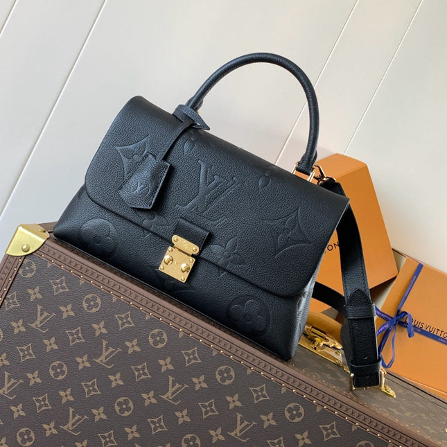 MADELEINE 30 IN BLACK MONOGRAM CALFSKIN EMBOSSED LOGO
