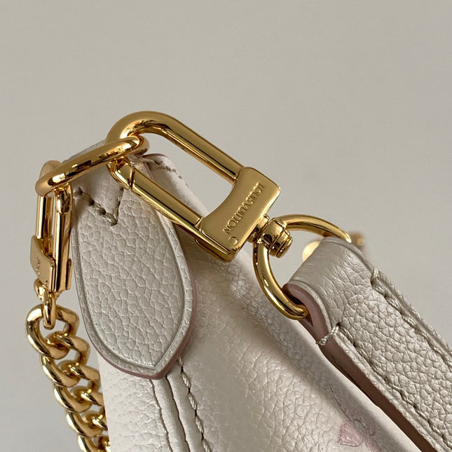 BOULOGNE 29 IN WHITE AND PINK MONOGRAM EMPREINTE CANVAS GOLD HARDWARE