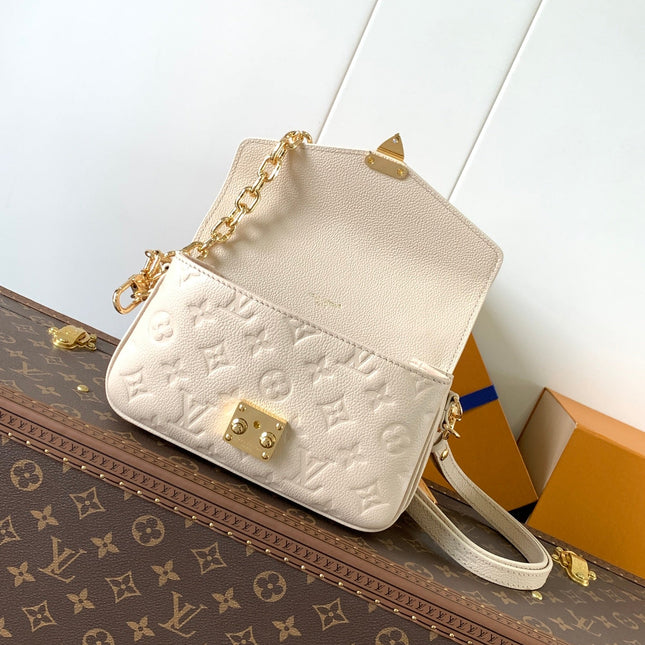 POCHETTE MÉTIS EAST WEST 22 IN LIGHT BEIGE MONOGRAM EMPREINTE CALFSKIN EMBOSSED