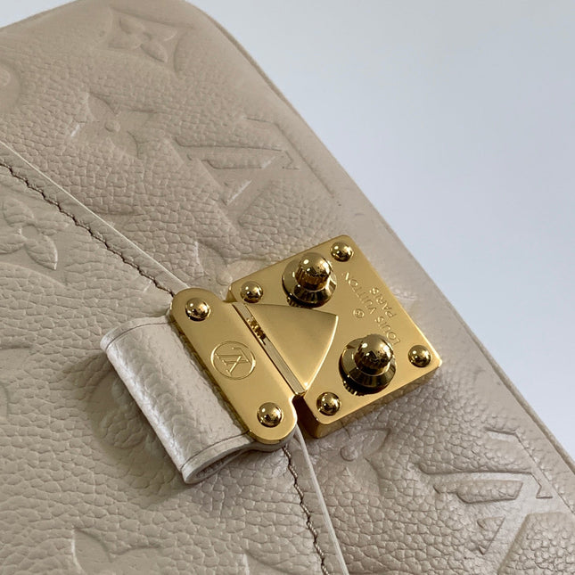 POCHETTE MÉTIS EAST WEST 22 IN LIGHT BEIGE MONOGRAM EMPREINTE CALFSKIN EMBOSSED