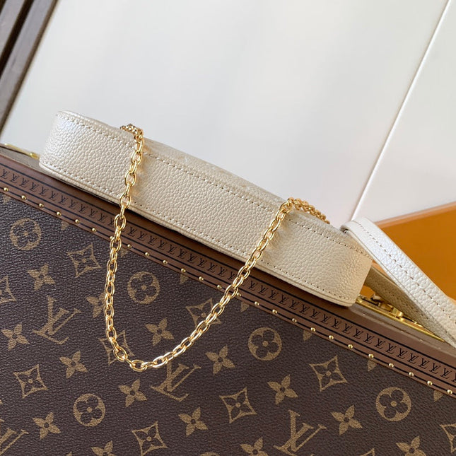 EASY POUCH ON STRAP 19 IN BEIGE MONOGRAM EMPREINTE LEATHER