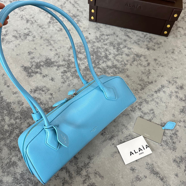 LE TECKEL MEDIUM BAG 32 IN SKY BLUE GOATSKIN