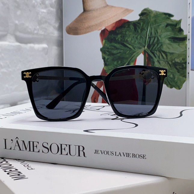 TRIOMPHE SUNGLASS 497820 IN GOLD METAL BLACK LENSES