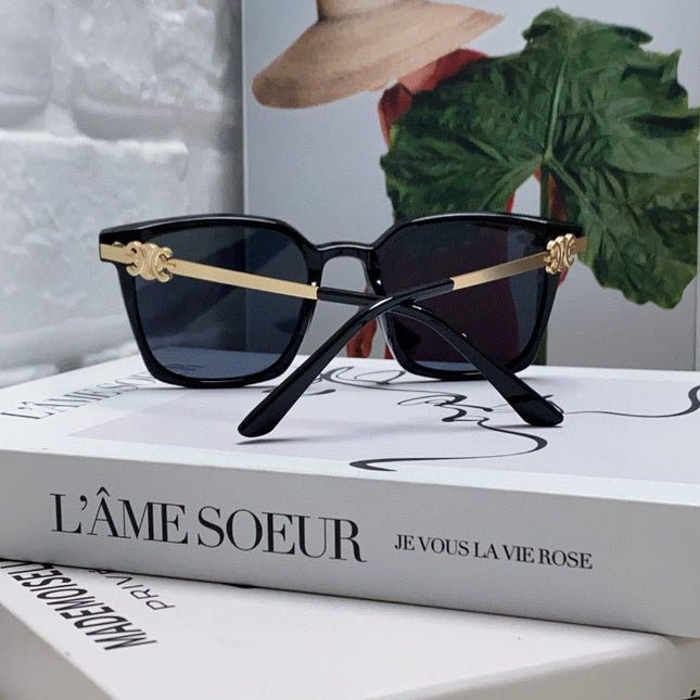 TRIOMPHE SUNGLASS 497820 IN GOLD METAL BLACK LENSES