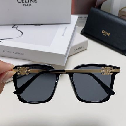 TRIOMPHE SUNGLASS 497820 IN GOLD METAL BLACK LENSES