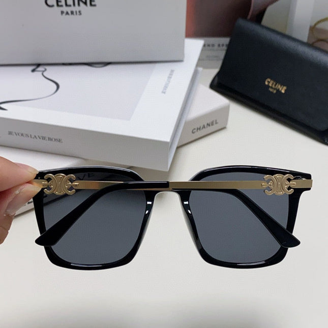 TRIOMPHE SUNGLASS 497820 IN GOLD METAL BLACK LENSES