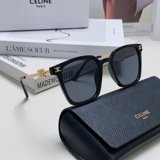 TRIOMPHE SUNGLASS 497820 IN GOLD METAL BLACK LENSES