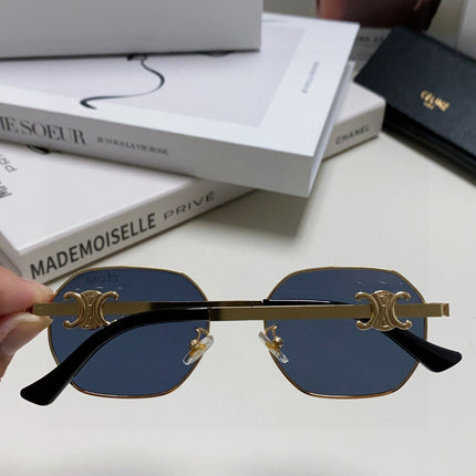 TRIOMPHE SUNGLASS 497823 IN GOLD METAL BLACK LENSES