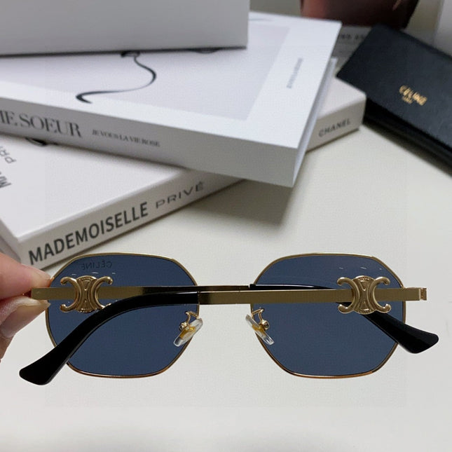TRIOMPHE SUNGLASS 497823 IN GOLD METAL BLACK LENSES