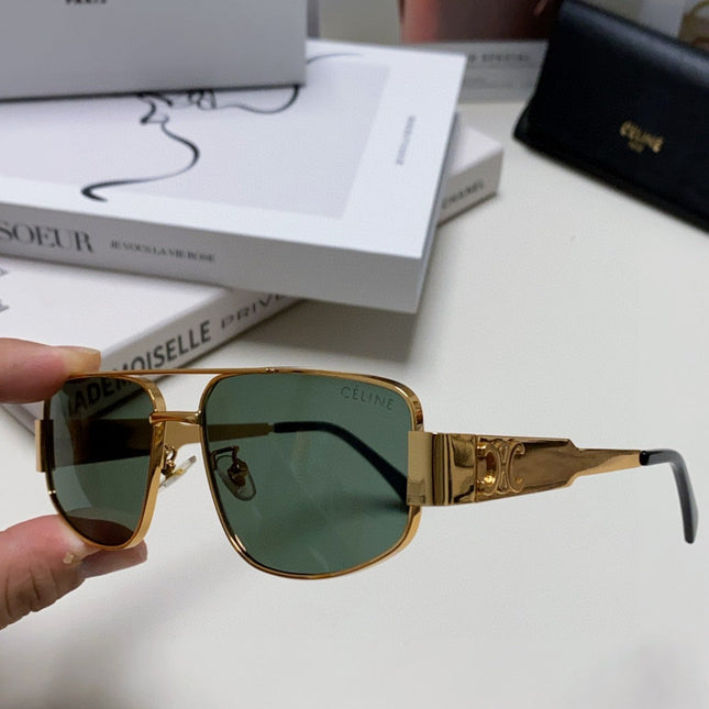 TRIOMPHE SUNGLASS 512997 IN GOLD METAL BLUE LENSES