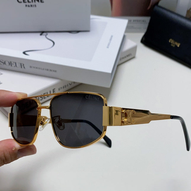 TRIOMPHE SUNGLASS 513000 IN GOLD METAL BLACK LENSES